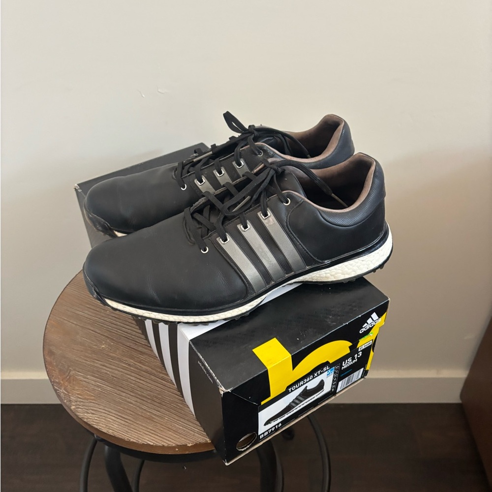 adidas Black Athletic Shoes with Silver Three-Stripes